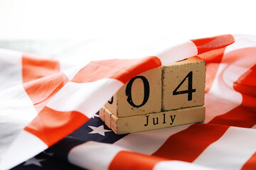 July 4th wooden Stars and Stripes flag on background with flag of the USA. Summer day. Independence...