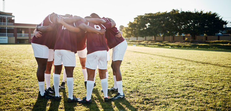Men, huddle and team on grass field for sports motivation, coordination or collaboration for goal. Group of sport athletes in fitness training, planning strategy in solidarity and support of game