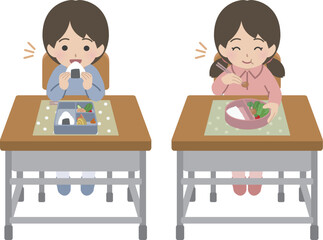 学校でお弁当を食べる児童