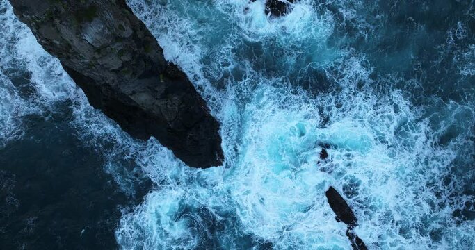 Ocean Waves Crashing On Jagged Coastline of Ponta de Sao Lourenco In Madeira Island, Portugal. - aerial overhead