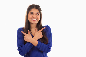 Portrait of beautiful woman gesturing against white background