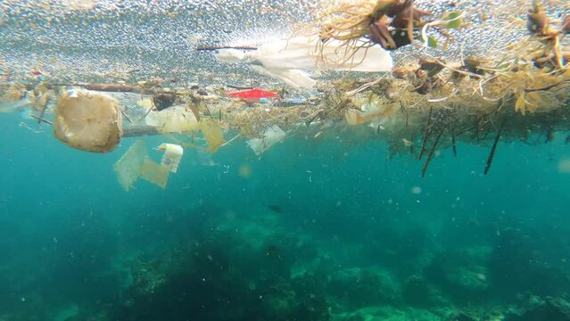 Plastic Waste And Garbage Floating In The Sea - Water Pollution Concept. - underwater