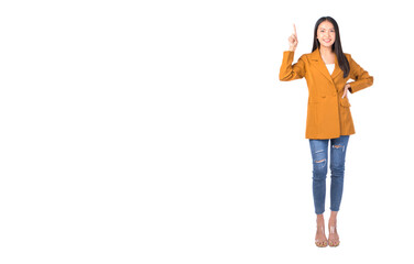 Full length portrait of a young female pretty asian woman positive pointing fingers away while standing white background	
