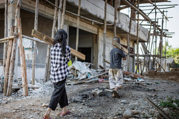 Children working at construction site for world day against child labor concept: