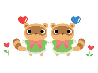 ハートの風船を持つタヌキの二人組