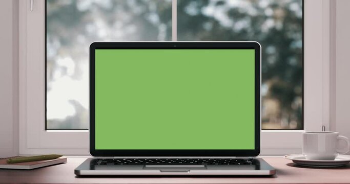 4k Resolution Video: Modern Laptop Mockup with Blank Green Screen Smooth Zoom in Home or Office Interior with Alpha Matte