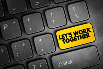 Fototapeta premium Let's Work Together text button on keyboard, concept background