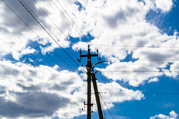 Power electric pole with line wire on colored background close up