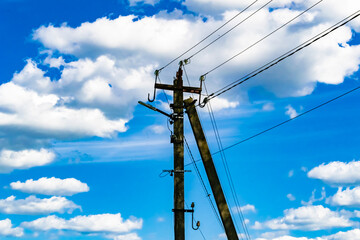 Power electric pole with line wire on colored background close up