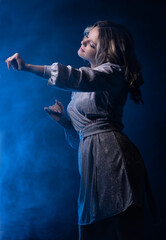 teenage girl in a silver dress