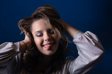 Naklejka premium teenage girl in a silver dress