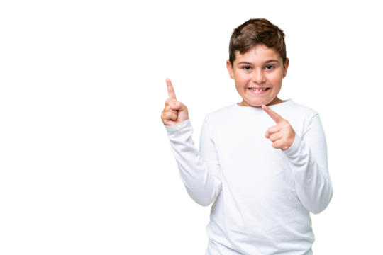 Little caucasian kid over isolated chroma key background frightened and pointing to the side