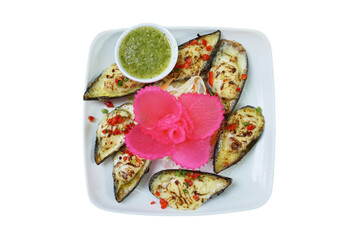 Mussels baked with cheese isolated background including pink vegetable flower and spicy seafood sauce.