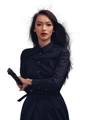 A samurai woman ninja in a martial art uniform ready to fight for power and fantasy. Asian female from Japan in black cosplay and makeup for action with metal weapon isolated on a png background. © peopleimages.com