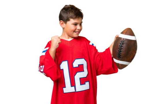 Little caucasian kid playing rugby over isolated chroma key background celebrating a victory - Powered by Adobe