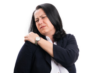 Businesswoman touching shoulder as strained muscle pain