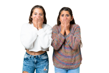 Friends girls over isolated chroma key background with surprise facial expression