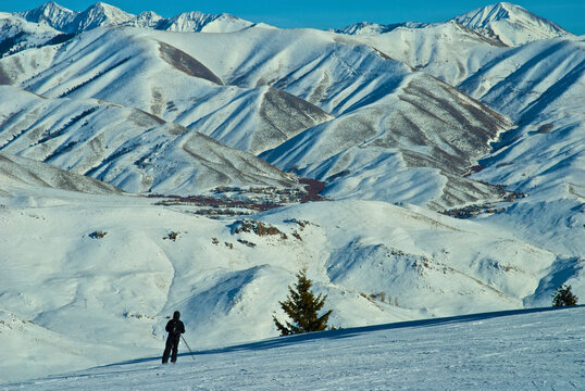 A Skier Skis In The Sawtooth Mountain Range