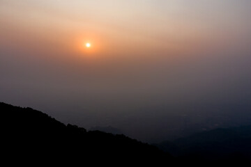 PM 2.5 in Sunrise view with the mountain foreground at Chiang Rai province, North of Thailand on 25...