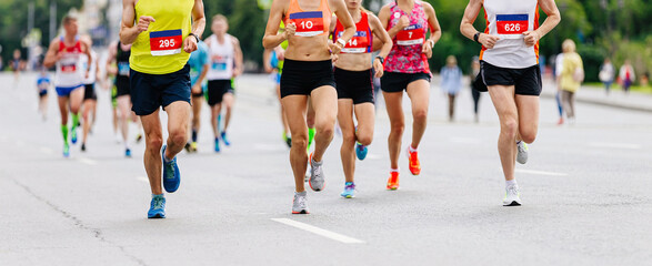 group runners athletes men and women run on marathon race