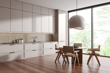 Corner view on bright kitchen room interior with dining table