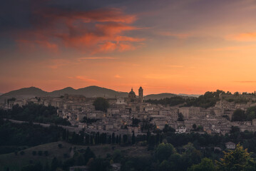 Urbino city skyline after sunset. Marche region, Italy.