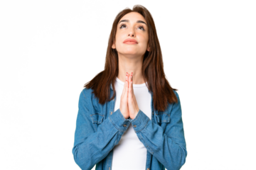 Young caucasian woman over isolated chroma key background keeps palm together. Person asks for something