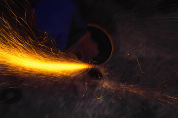 long exposure photo car repair, installation of rear disc brakes instead of drums, welding,...