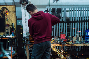 long exposure photo car repair, installation of rear disc brakes instead of drums, welding,...