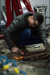 long exposure photo car repair, installation of rear disc brakes instead of drums, welding, locksmith and turning works	