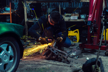 long exposure photo car repair, installation of rear disc brakes instead of drums, welding, locksmith and turning works	