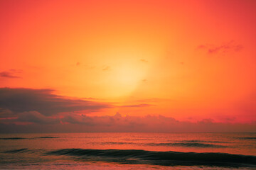 Fototapeta na wymiar Seascape in early morning, orange sunrise over the sea. Nature landscape