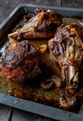Roasted turkey legs on wooden table. Delicious sunday or holiday roast dish