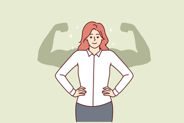 Successful businesswoman stands with hands on waist imagining giant muscular arms behind back. Businesswoman feels strength and leadership skills after gaining new knowledge or training for management