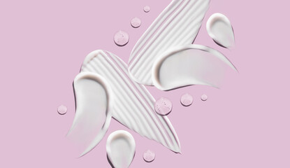 cosmetic smears cream texture on pastel pink background