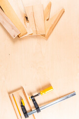 Carpentry Profession Ideas. Variety of Separate Lineup of Assorted Working Tools on Wood Material.