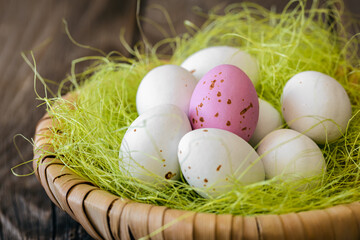 Easter composition with eggs in a decorative nest.