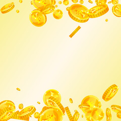 Chinese yuan coins falling. Scattered gold CNY