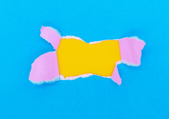 Colored paper torn in the middle, copy space
