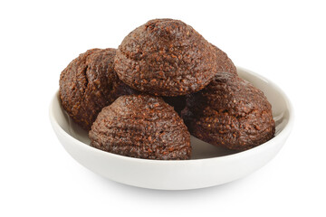 chocolate cookie with kerob, banana, cashew, sunflower seeds in ceramic bowl isolated on white background. Healthy food gluten-free, flour-free