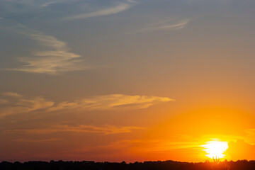 sunset sky with multicolor clouds. Dramatic twilight sky background