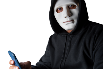 Close-up. An anonymous hacker wearing a mask and black hoodie shows off a smartphone with a blank white screen. Hacking and malware concept. Transparent background. png.file
