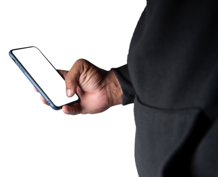Close-up. An anonymous hacker wearing a mask and black hoodie shows off a smartphone with a blank white screen. Hacking and malware concept. Transparent background. png.file