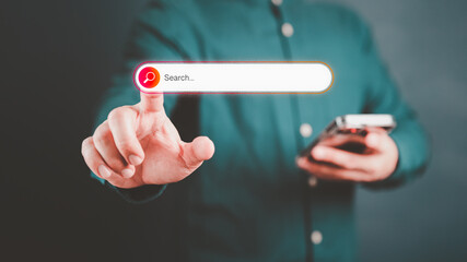 Information Search Technology SEO Search Engine Optimization. Search button on virtual screen pressed with finger for data and information. Using Search Console with your website. Web search concept.