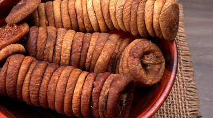 Fresh Figs or Anjeer fruit healthy vegan food concept organic dry fruits on wooden background.