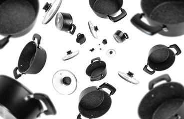 Collection of falling stone black pot isolated on white background. Selective focus