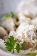 Dumplings with sour cream and butter. Traditional food. Macro photo