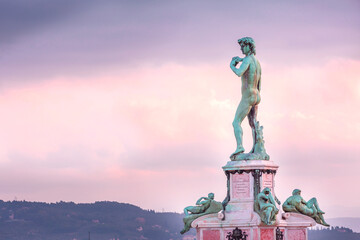 Florence, Italy sunrise at Piazzale Michelangelo with David replica statue at Michelangelo square...
