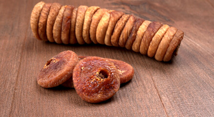 Fresh Figs or Anjeer fruit healthy vegan food concept organic dry fruits on wooden background.