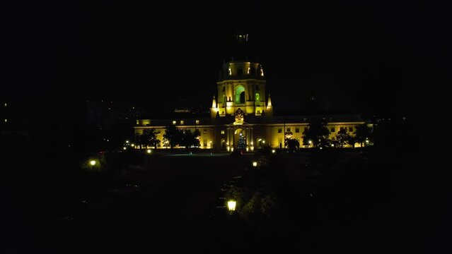 Pasadena City Hall and Christmas tree at night - push forward aerial establishing shot